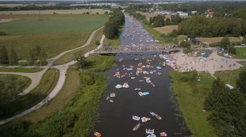 High angle Drone fly over in Finnish beer float event Stock Footage 45187558