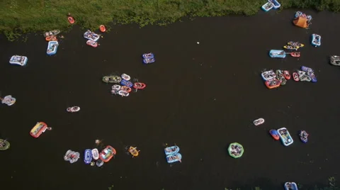 High angle  Drone fly over in Finnish beer float event Stock Footage 45187825