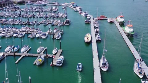 High Angle Drone Following Vessel to Harbour Dock 4k Stock Footage 320946509