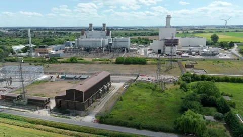 High angle drone footage of electricity substation converting power from main Stock Footage 313275362