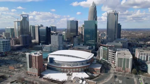High-Angle drone footage of uptown Charlotte by Spectrum Center Stock Footage 167617693