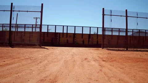 High angle drone reveals Mexican town at wall Stock-Footage 63442339