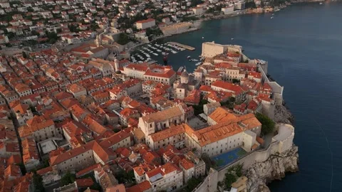 High Angle Drone Reverse Parallax Pull Back Dubrovnik Harbour Side Sunset 4K 動画素材 337850318