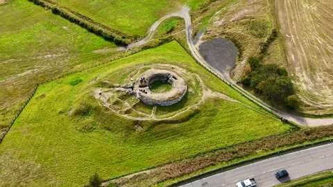 High-Angle Drone Shot of Ancient Scottish Stone Structure Stock Footage 330675096