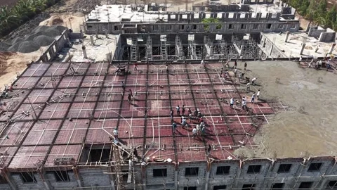 High Angle Drone Shot of Building Slab Casting with Construction Workers at Stock Footage 340301273