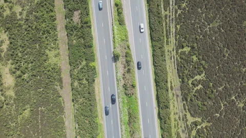 A high angle drone shot of a busy motorway. Stock Footage 285311449
