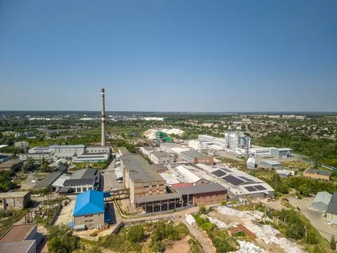 High angle drone shot captures industrial facility complex with large brick b Fotos Stock