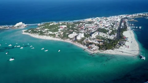 High-angle drone shot capturing the thin profile of Isla Mujeres, Mexico Stock Footage 331519704