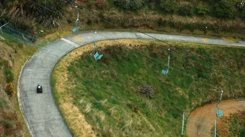 High angle drone shot of luge track at Skyline Rotorua Stock Footage 89811672