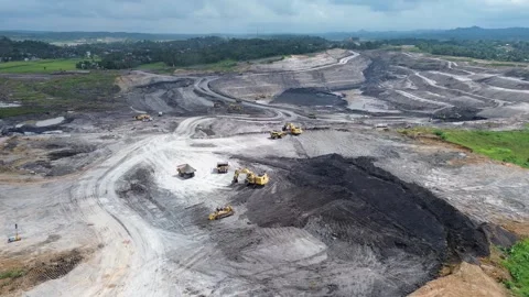 High angle drone shot showing curved terraced structure of open pit coal mining  Video stock 329290240