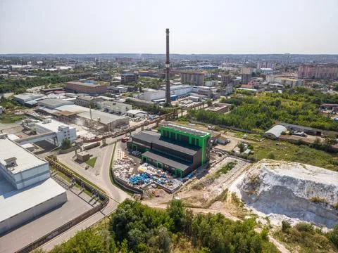 High angle drone shot shows modern waste management facility with green roof  Fotos Stock