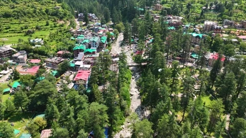 High angle drone tracking shot looking directly down at the colorful tin ro.. Stock Footage 345275020