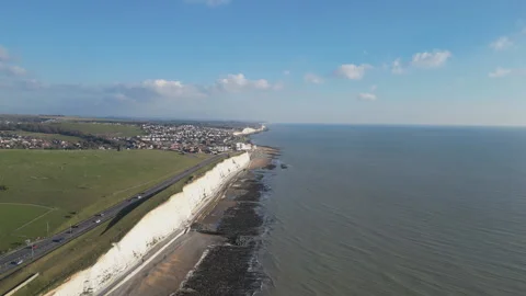 A high angle drone video of the sea coastline with white cliffs. Stock Footage 274996708