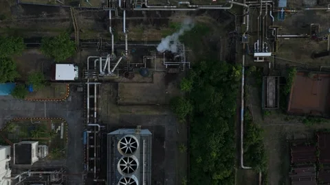 High-angle drone view captures cooling towers and emission of geothermal steam. Stock Footage 336744072
