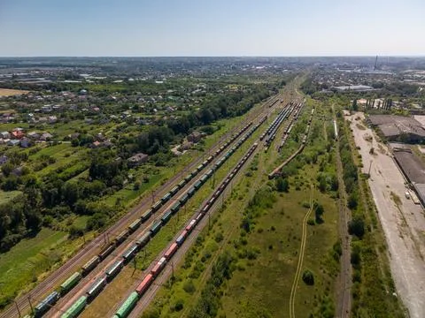 High Angle Drone View of Extensive Railroad Junction with Cargo Trains Stock Photos