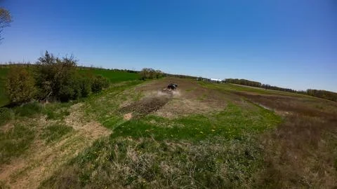 High angle drone view of a farm tractor prepping a soil field Stock-Fotos