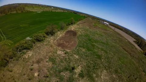 High angle drone view of a freshly tilled oval food plot Stock Photos