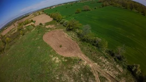 High angle drone view of a freshly tilled oval food plot Stock Photos