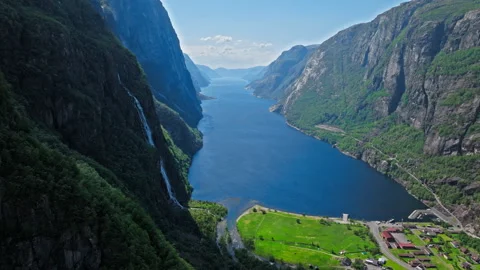 High angle drone view of Geirangerfjord surrounded by towering cliffs in Norway. Stock Footage 328130598