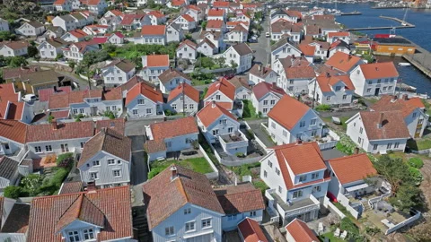 High angle drone view of old wooden homes and narrow streets in Risor Norway. Stock Footage 328125158