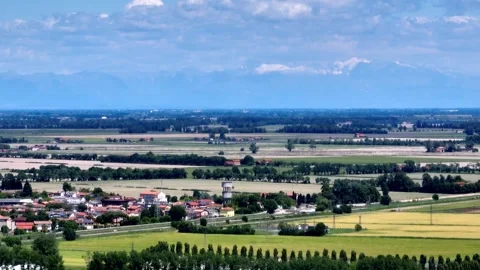 High angle drone view over small countryside villages and green agricultural Stock Footage 336553900