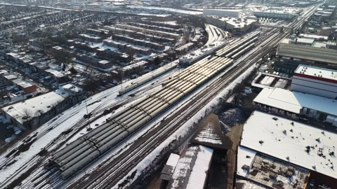 High angle drone view of passenger trains parked at a railway depot and 動画素材 331087255