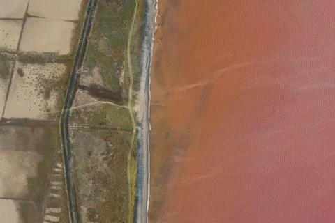 High angle drone view of pink lake where salt is extracted Foto stock
