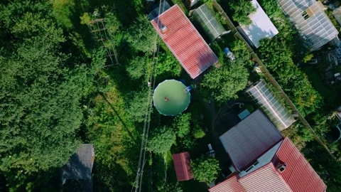 High Angle Drone View of Residential Neighborhood and Pool in Baltic Latvia 스톡 동영상 330977653