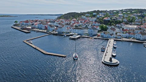 High angle drone view of Risor Norway harbour with breakwater pier. Stock Footage 328125764