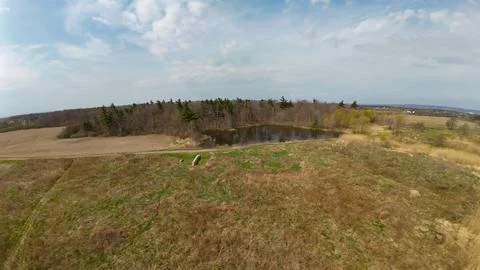 High angle drone view of a rural landscape with bee hives Stock Photos
