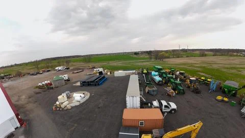 High angle drone view of a rural agricultural machinery yard Stock Photos