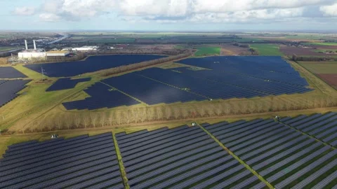 High angle drone view of a sprawling utility solar array on a bright sunny Stock-Footage 336322862