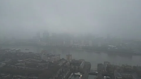 High angle drone view of the Thames riverside in central London in the fog. Stock Footage 301495054