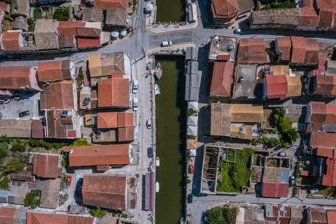High angle drone view of water canal in Lefkimmi, small town on Corfu, Greece Stock Photos