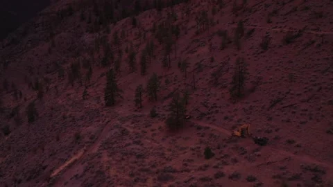 High Angle Evening Excavator Dragging Trammel Drone Shot Stock Footage 146553182