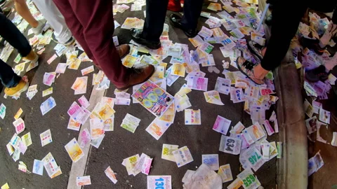 High angle of fair tickets and paper money piled up on the floor, Tenerife Stock Footage 198892687