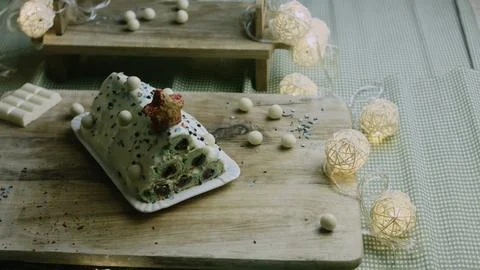 High angle festive cake surrounded by white chocolates Stock Photos