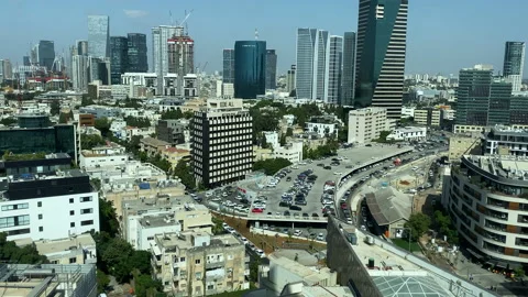 High angle floaty view of portion of Tel-Aviv Israel skyline - clear day Stock Footage 165776031