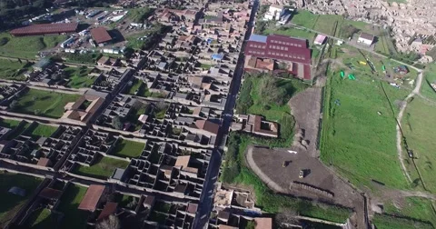 HIGH ANGLE FLY OVER OF FAMOUS POMPEI ARCHAEOLOGICAL ROMAN RUINS Stock Footage 61872601