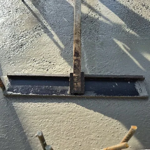 High Angle Front View of Worker Smoothing Fresh Wet Concrete Video stock 332595363