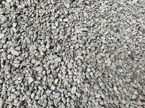 ​High angle full frame background view of small crushed gravel rocks texture Stock Photos