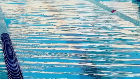 High angle full frame shot of rippling blue water in an outdoor swimming pool Stock Footage 342206659