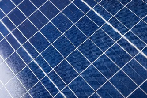 High angle full frame shot of white grid patterns on blue solar panel, copy Stock Photos