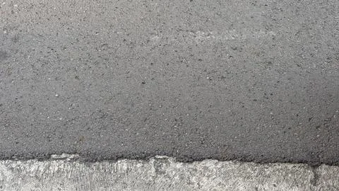 High angle full frame texture view of a freshly paved dark gray asphalt roa.. 写真素材