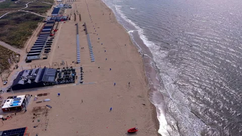 High angle horizontal aerial drone video clip of beach pavilion, rescue Видео 342737061