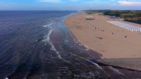 High angle horizontal aerial drone video clip of sandy beach, beach outlet Stockbeeldmateriaal 342737062
