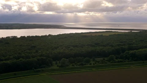 High angle horizontal aerial drone video clip of forest, Veerse Meer, North.. Vídeos de archivo 342765416