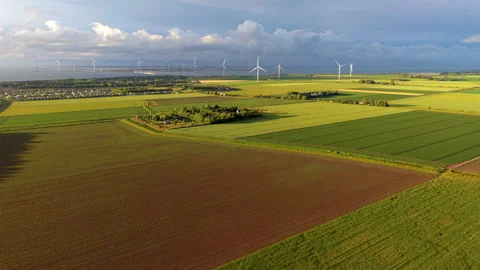 High angle horizontal aerial drone video clip of agricultural fields, wind Video stock 342819454