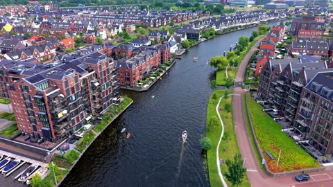 High angle horizontal aerial drone video clip of river canal, motorboats Video stock 342995369