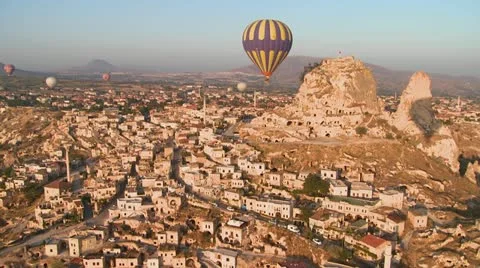 A high angle of hot air balloons flying over the ancient region of Cappadocia, Stock Footage